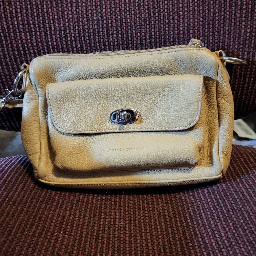Stone Mountain Tan Purse. Zip Top opening, Front Flap Pocket with Clasp Opening
